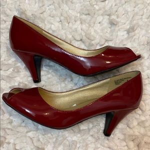 Red Patent Peep-Toe Pumps. 2-3/4 inch heel.